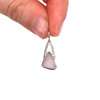 Lavender Triangle Sea Glass Lunar Drop Charm held to the light