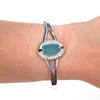Turquoise Sea Glass Rising Sun Cuff Bracelet on model for color reference. 