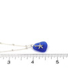 Cobalt Triangle Sea Glass and Petite Starfish Charm Necklace on ruler for size reference