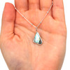 Abalone Aura Triangle Charm on model for color reference.