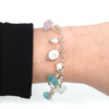 Perfectly Pastel Sea Glass and Shiva Shell Charm Bracelet on model for color reference.