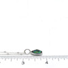 Abalone Ocean Wave Charm on ruler for size reference.