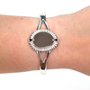 Gray Sea Glass Rising Sun Cuff Bracelet on model for color reference. 