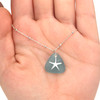 Aqua Triangle Sleek Starfish Sea Glass Necklace on model for color reference. 
