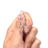 Pink Sea Glass and Ruby Lunar Drop Earrings on model for color reference.