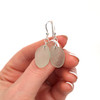Seafoam Drift Sea Glass Simply Drilled Earrings on model for color reference. 