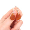 Amber Cinnamon Sea Glass Simply Drilled Earrings on model for color reference.
