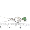 Seafoam Bright Sea Glass Ocean Wave Necklace on ruler for size reference.