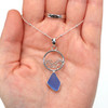 Cornflower Sea Glass Ocean Wave Necklace on model for color reference.