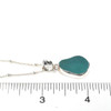 Aqua Droplet Sea Glass Single Bezel Necklace on ruler for size reference. 