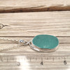 Insta Sale Aqua Oval Sea Glass Twist Necklace - MM on ruler for size reference. 
