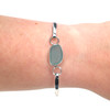 Aqua Oval Sea Glass Hinge Bangle Bracelet on model for color reference. 