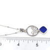 Cobalt Sea Glass Ocean Wave Necklace on ruler for size reference.