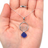 Cobalt Sea Glass Ocean Wave Necklace on model for color reference.