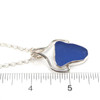 Cornflower Medium Triangle Sea Glass Pharaoh Necklace on ruler for size reference. 
