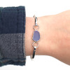 Cornflower Sea Glass Hinge Bangle Bracelet on model for color reference. 