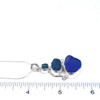Turquoise Blues Ultra Rare Sea Glass Three Tier Swirl Necklace on ruler for size reference. 