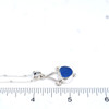 Blue Arctic Blast Ultra Rare Sea Glass Tidal Drop Necklace on ruler for size reference. 