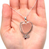 Pink Sea Glass and Ruby Swirl Heart Necklace on model for color reference.