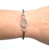 White Oval Sea Glass Bezel Hinge Bracelet on wrist for color reference