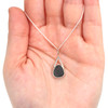 Olive Sea Glass Lunar Drop Charm on model for color reference. 