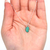 Turquoise Petite Drop Charm on model for color reference. 