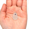White Icicle Sea Glass and Lapis Gemstone Drop Necklace on model for color reference.