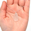 White Snow Sea Glass and Labradorite Gemstone Drop Necklace on model for color reference.