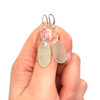 Seafoam Elongated Oval Sea Glass Simply Drilled Earrings on model for color reference. 