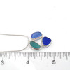 Beautiful Blues Circle of Life Sea Glass Necklace on ruler for size reference