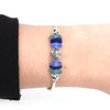 Beautiful Blues Sea Glass and Pearl Daisy Bracelet on model for color reference.