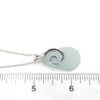 White Gray Soothing Sea Glass Journey Necklace on ruler for size reference.