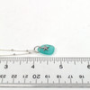 Aqua Starfish Petite Charm Necklace on ruler for size reference