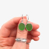 Green Round Sea Glass Bezel Earrings on model for color reference. 