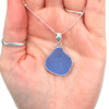 Cornflower Pear Sea Glass Bezel Necklace in hand for color reference