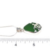 Green Sea Glass Swimming Turtle Necklace on ruler for size reference. 

