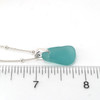 Aqua Bright Sea Glass Pinch Necklace on ruler for size reference. 