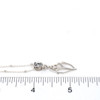 Sterling Silver Conch Shell Necklace on ruler for size reference. 

