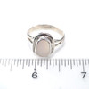 White Opalescent Milk Glass Sea Glass Double Bezel Split Band Ring - Size 9 on ruler for size reference. 
