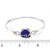 Cobalt Sea Glass Wave Bracelet on ruler for size reference. 