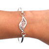 Pink Sea Glass and Ruby Wavy Hinge Bangle Bracelet on model for color reference.