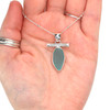 Aqua Oval Sea Glass Toggle Bar Necklace on model for color reference. 