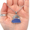 Cornflower Cloud and Rainbow Sea Glass Necklace in hand for color reference