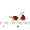 Red Sea Glass and Diamond Gold Earrings on ruler