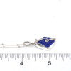 Cobalt Sea Glass Wave Necklace on ruler for size reference. 
