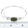 Olive Oval Sea Glass Hinge Bangle Bracelet on ruler for size reference. 