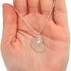 White Sea Glass and Tiny Starfish Nautical Charm Necklace on model for color reference.