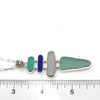 Bright Blues Sea Glass Sticks Four Tier Bezel Necklace on ruler for size reference
