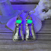 Seafoam UV Milk Glass Lighthouse Earrings under black light