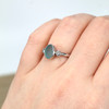sea glass engagement ring on model